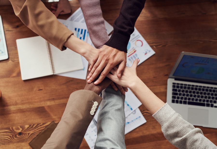 Recruitment consultants collaborating on a hiring mandate